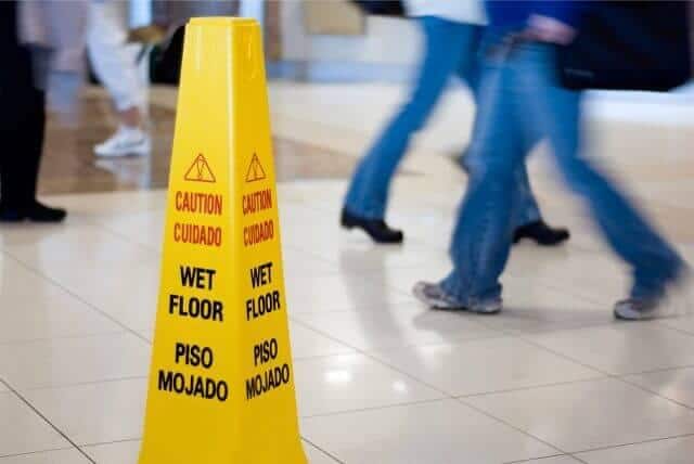 slip and fall wet floor warning sign Van Sant Law