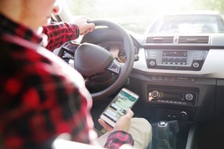 texting and distracted driver in GA Van Sant Law