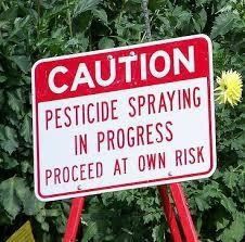 pesticide spray warning sign